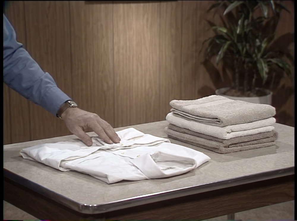 The Helping Hand folding laundry